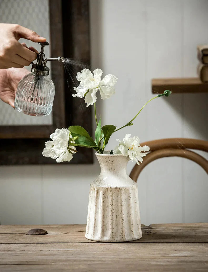 Classic American-style ceramic jug vase for dried flower arrangements.