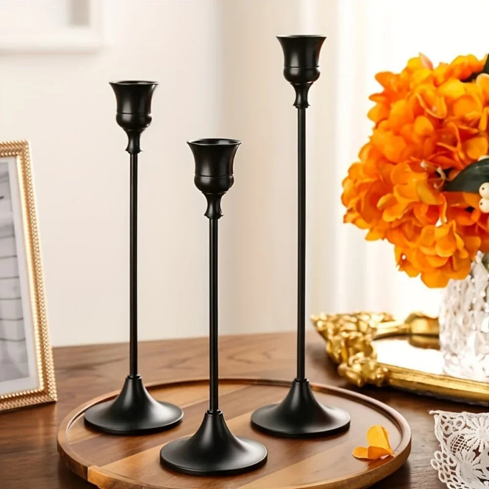 Black alloy geometric candlestick with minimalist Nordic design.