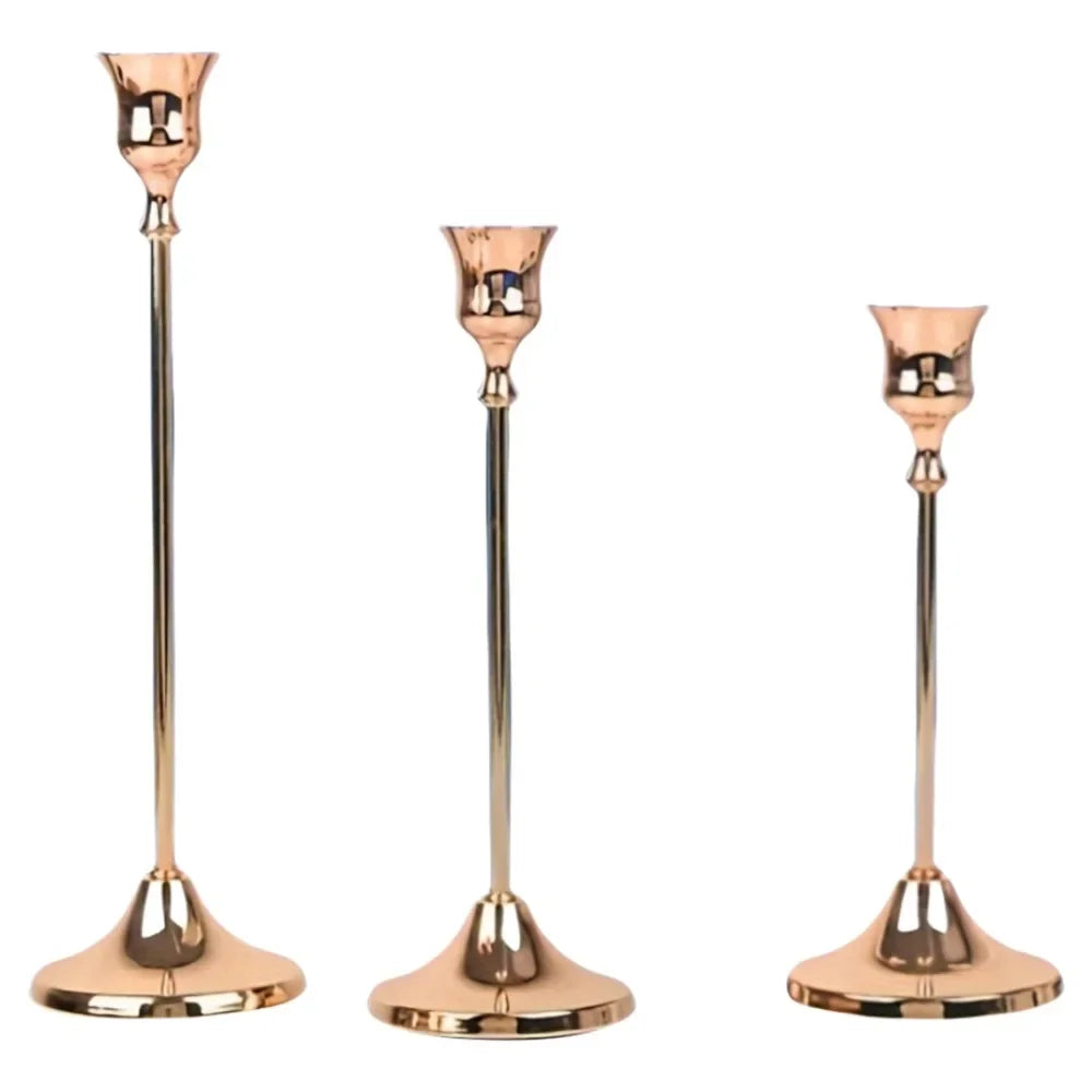 Peach metallic candle holder for chic Scandinavian interiors.