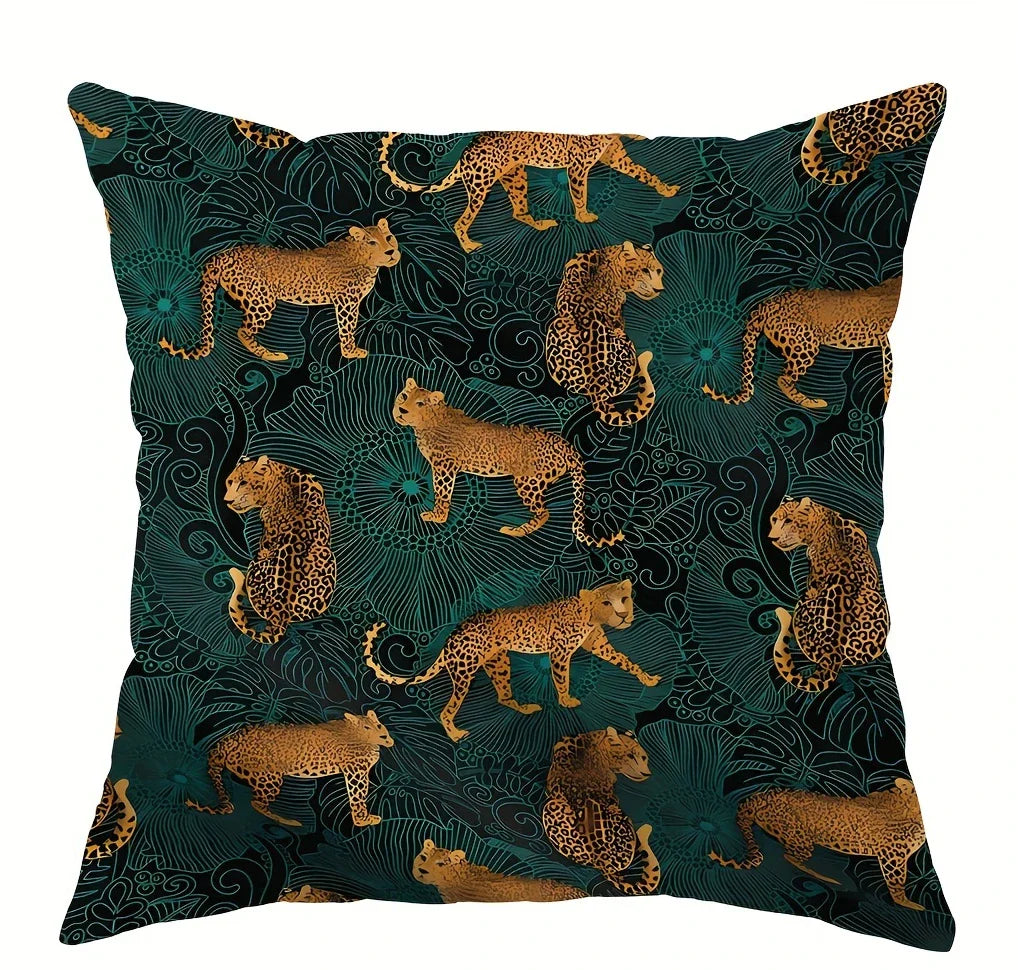 Exotic leopard pillow cover with burnt orange and green details.