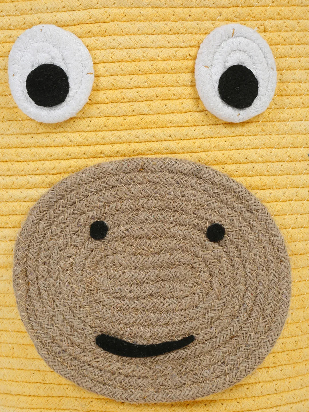 Handwoven yellow giraffe laundry bin